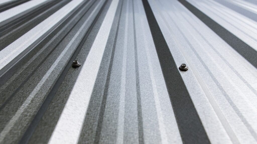 Metal roof with bolts in perspective.